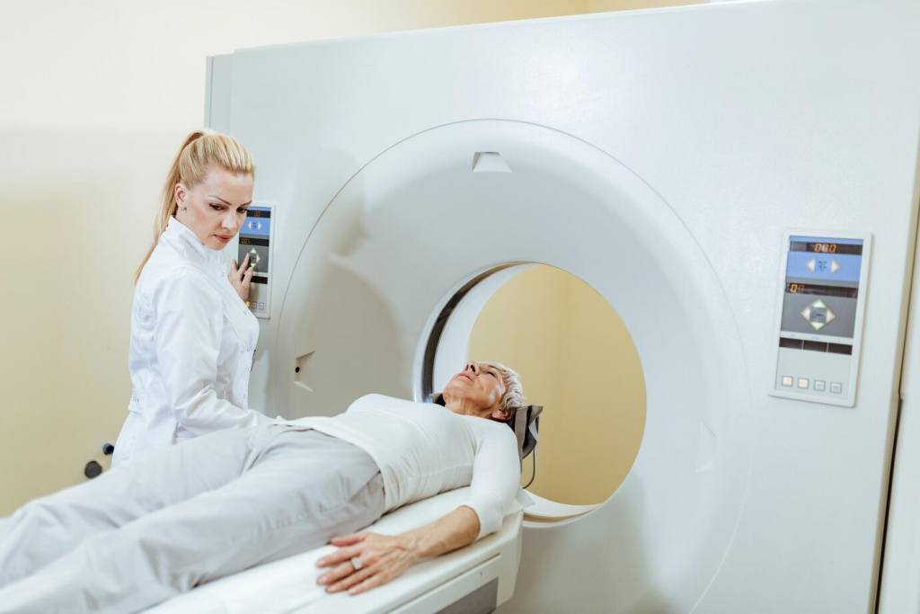 female-medical-technician-mature-patient-ct-scan-procedure-examination-room-hospital_637285-4993.jpg
